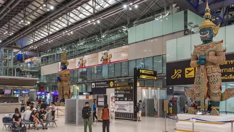 The giant Yaksha guardian statues in the passenger hall of Suvarnabhumi Airport